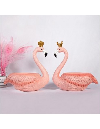 Figurines Flamant Rose hantent personnes